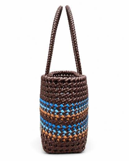 Woven handbag with brown and blue pattern on a white background