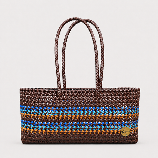 Woven handbag with blue and orange stripes on a white background